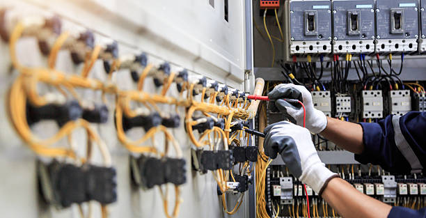 Professional Electrician technician working in Putney, GA